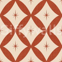 Mid-century geometric wallpaper with tiled diamond forms and starburst centers.