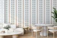 A peaceful wall mural with a retro, striped design.

