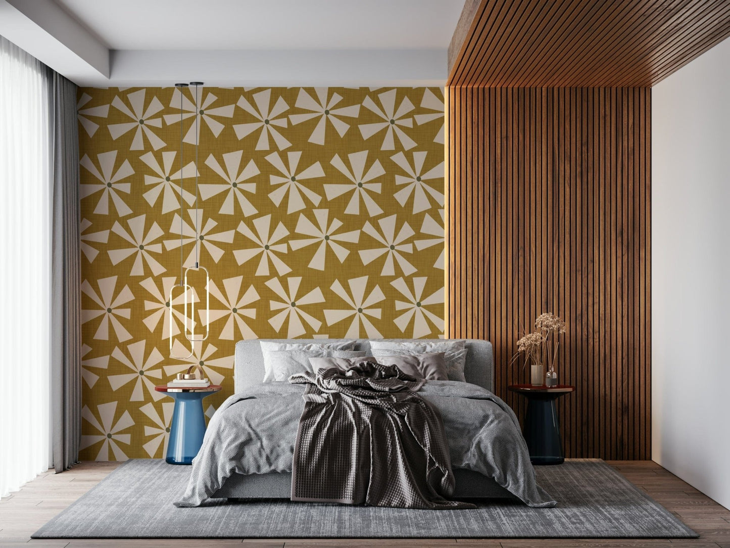 Retro sunburst bloom wallpaper featuring cream starburst flowers on a mustard yellow background.
