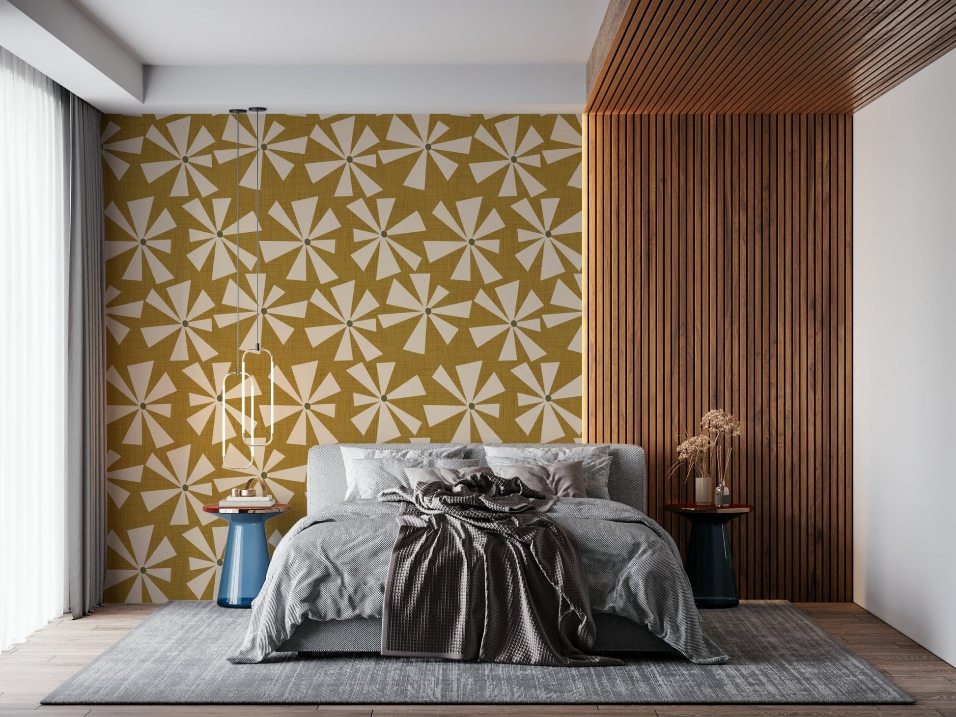 Retro sunburst bloom wallpaper featuring cream starburst flowers on a mustard yellow background.