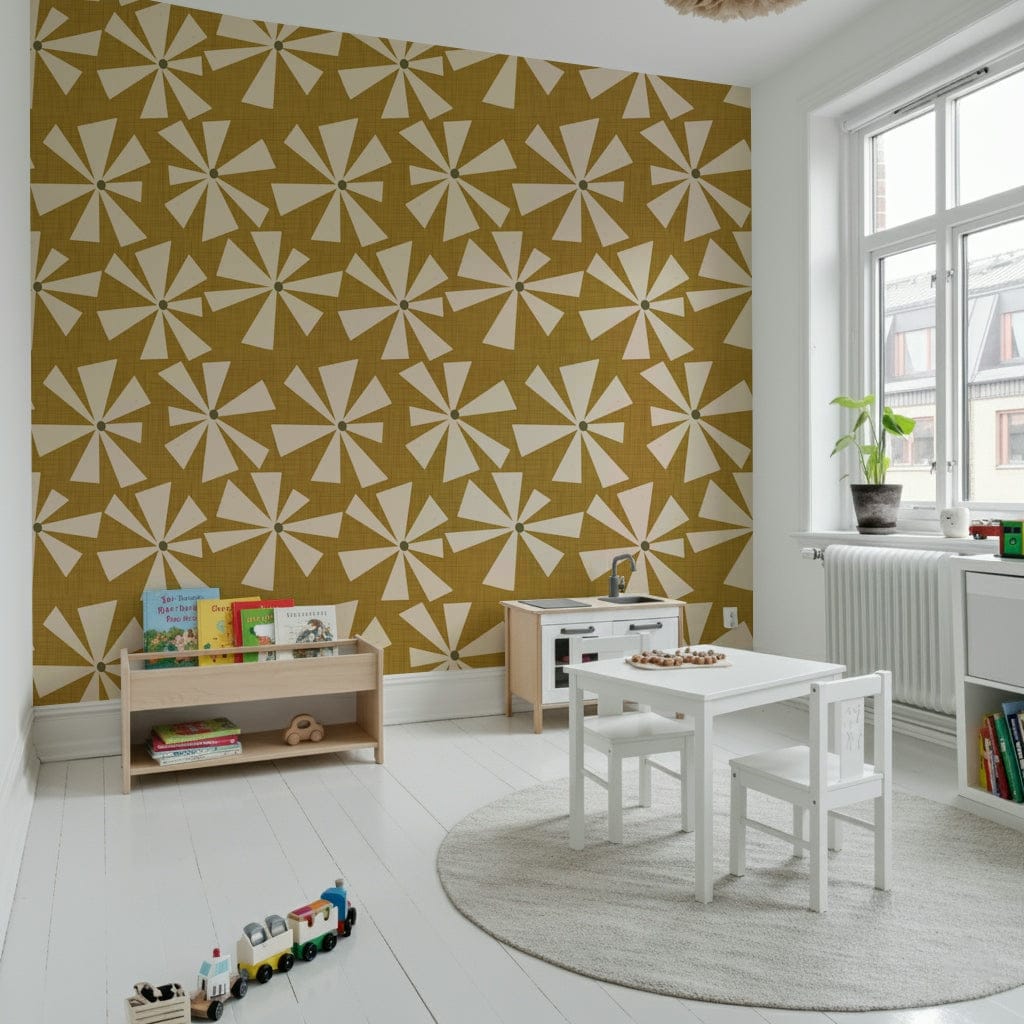 Decorative wallpaper with playful cream flower bursts set against a rich mustard tone.