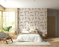 Coastal wallpaper decorated with whimsical surfboards and small illustrated road-trip cars.