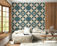 Stylized teal flower-like circles and leaf accents arranged in a vintage geometric wallpaper layout.