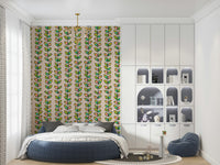 Vertical vine stripes with playful retro leaves adding color and movement to the off-white wallpaper.