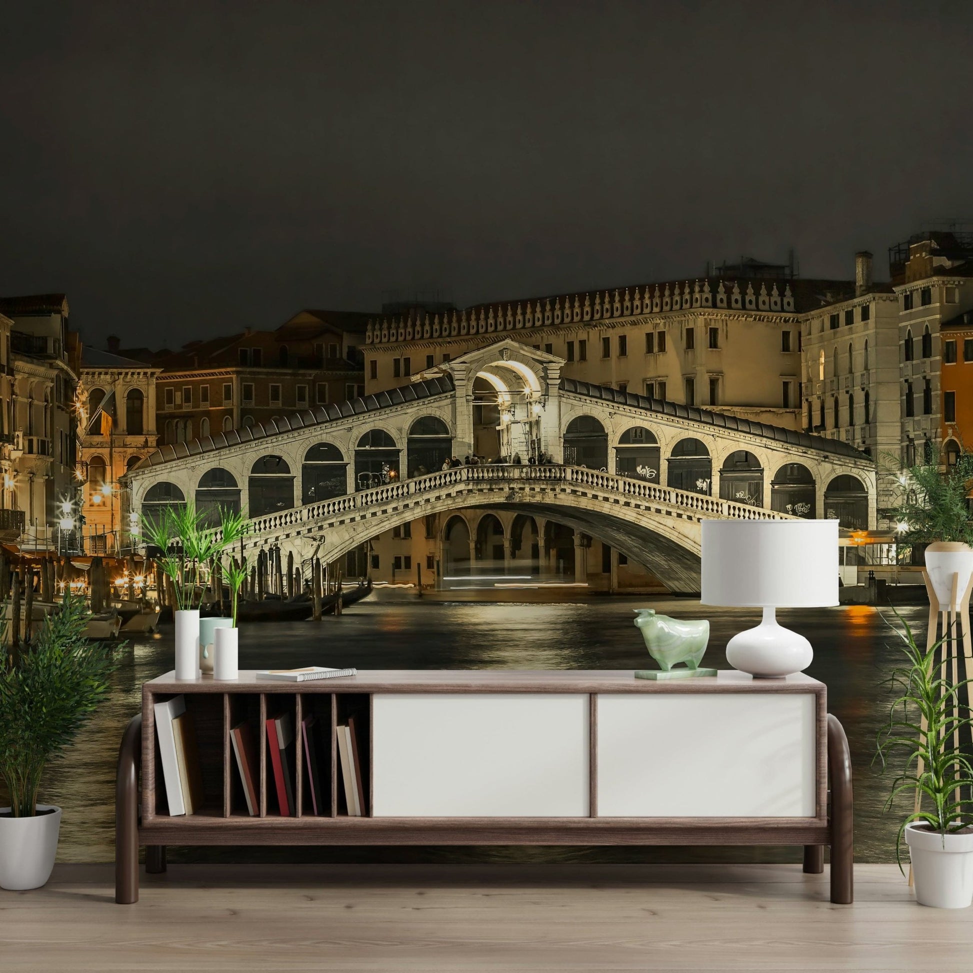 Venetian bridge night mural in dining room, warm lighting and contemporary chairs