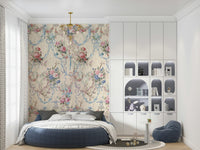 Ribbon Rose Serenade Chinoiserie wallpaper mural with pink roses and blue ribbons behind a round navy bed in a bedroom
