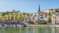 Riverside Charm: Lyon Wall Mural behind sofa, home styling