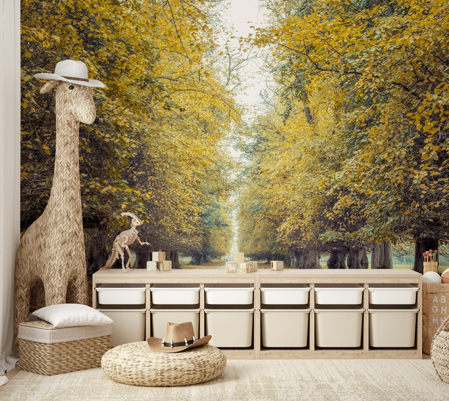 Fallen leaves are visible on the ground along the sides of the road.
