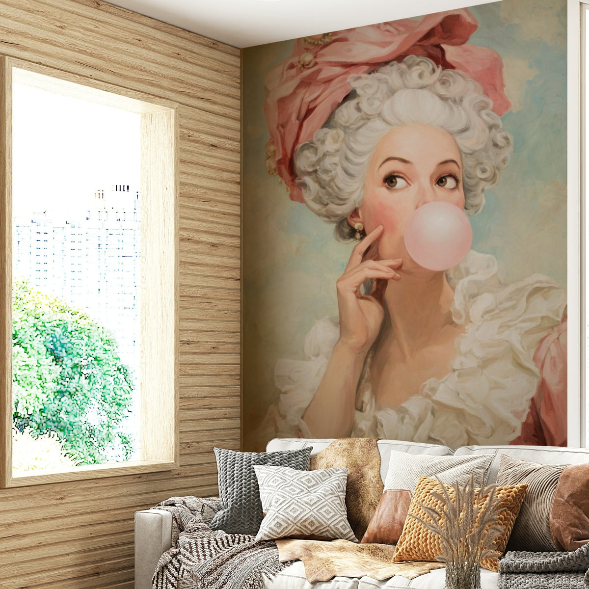 Rococo Lady Blowing Pink Bubble Gum mural of a wigged noblewoman blowing a pink bubble above a grey cushioned sofa in a living room