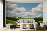 The colors are soft and gentle, with various shades of green.

