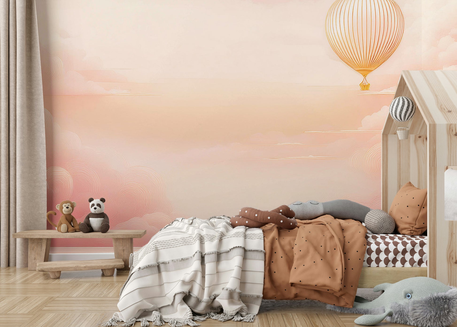 Modern pastel cloud wall decor behind a velvet sofa in a sitting area.