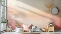 Rose Blush Sky Wall Mural styled with gold accents in a modern dining room.