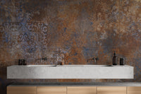 Faded ornamental wallpaper in rustic tones
