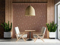 Warm-toned wallpaper with simple sketched blooms and foliage in a subtle repeating pattern