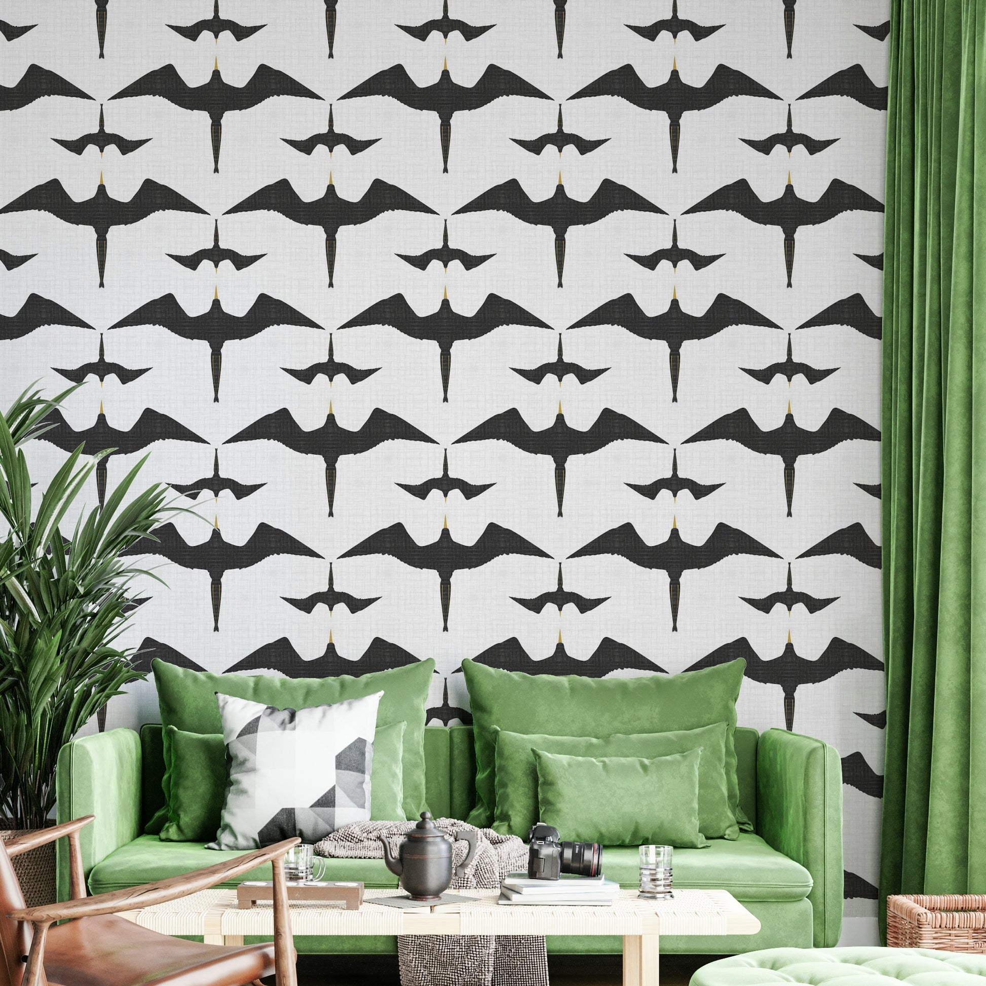 Frigatebirds in motion on rustic white wall covering

