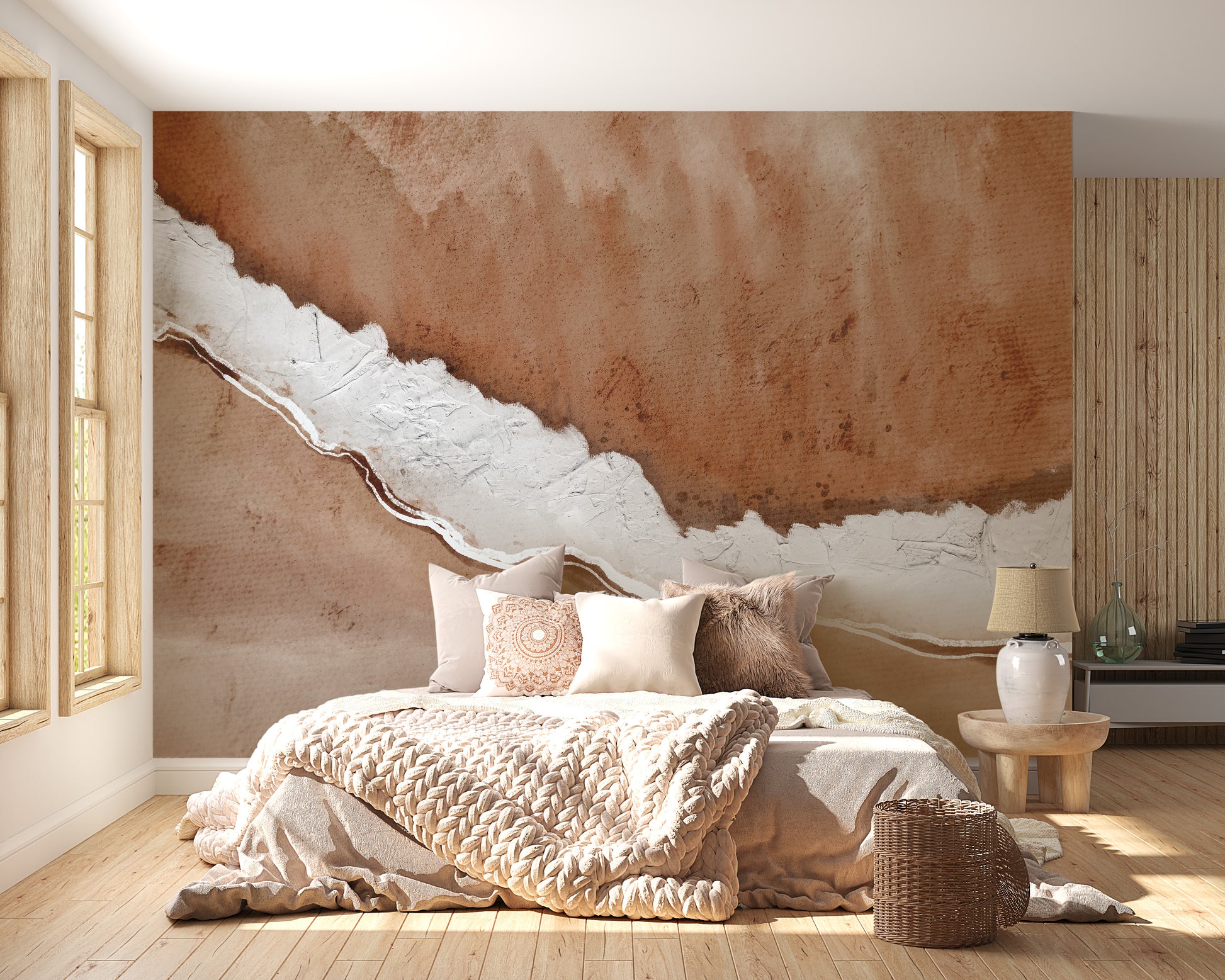 Rustic Horizon Textured wallpaper mural in rust and white plaster behind a bed with cream bedding in a bedroom