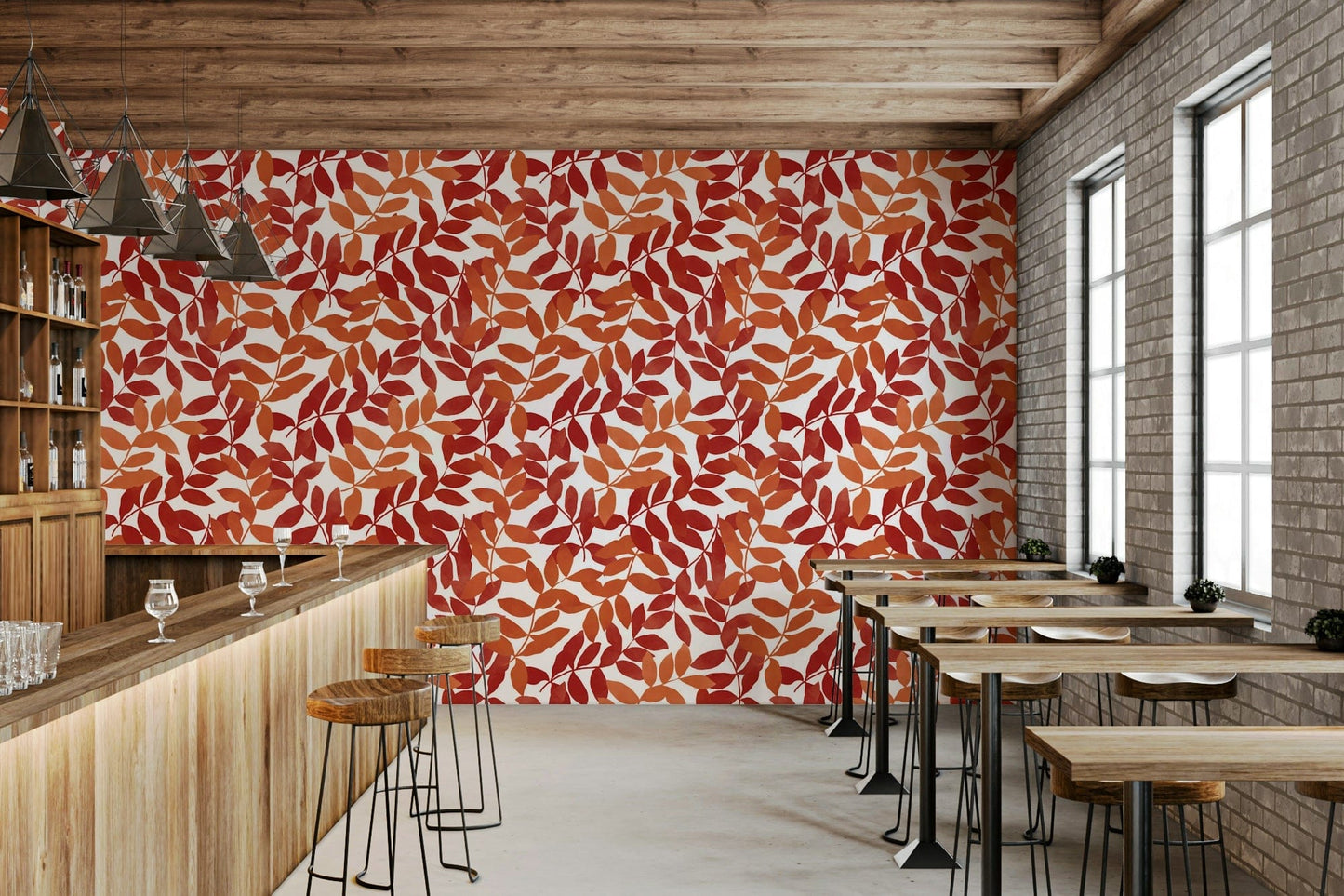 Rustic Leaves wallpaper in red and orange behind a wood bar counter and stools in a cafe seating area