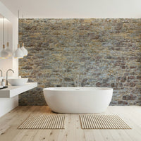 Aged Weathered Stone Brick wall mural, textured stone appeal.