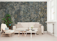 Decorative mural featuring layered stone textures in soft, earthy tones.
