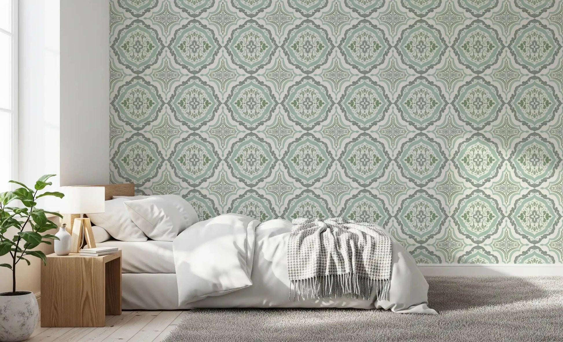 Subtle Sage Bloom Tile Wallpaper with a repetitive leaf pattern.