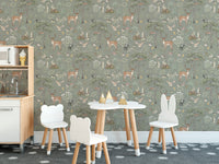 Sage Green Wildlife wallpaper in a kids room with bear and bunny ear stools and a white play kitchen