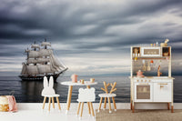 Large scale maritime ship wallpaper for a boy's bedroom with navy and beige tones.