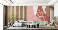 Gentle flowing shapes in blush and beige tones giving the wallpaper a soft coastal feel.