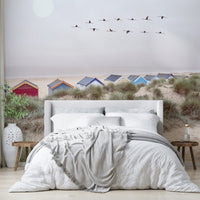 Relaxing beach wall mural with soft colors and ocean view.

