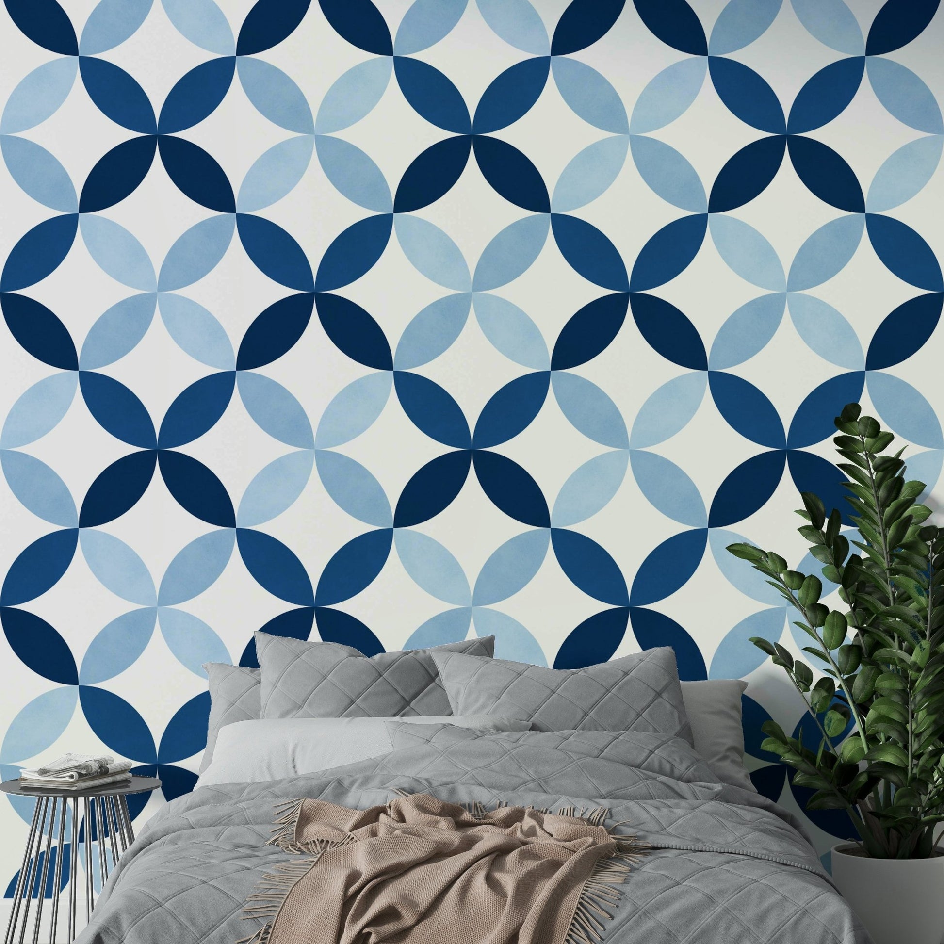 The room feels sophisticated and luxurious due to the deep color.

