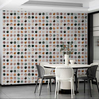 Hand-drawn dot wallpaper in soft orange and beige.

