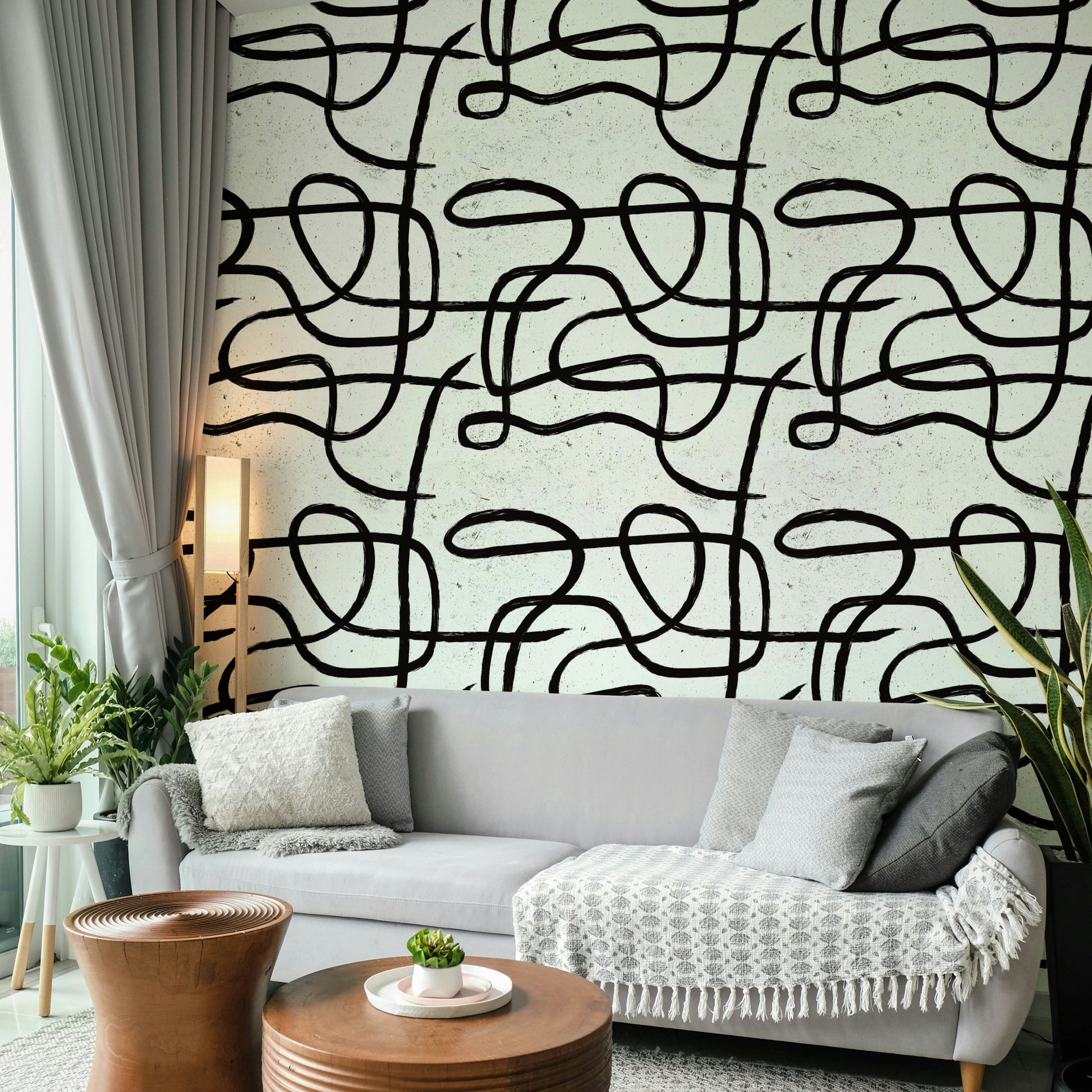 Neutral-toned wallpaper with abstract marker lines.

