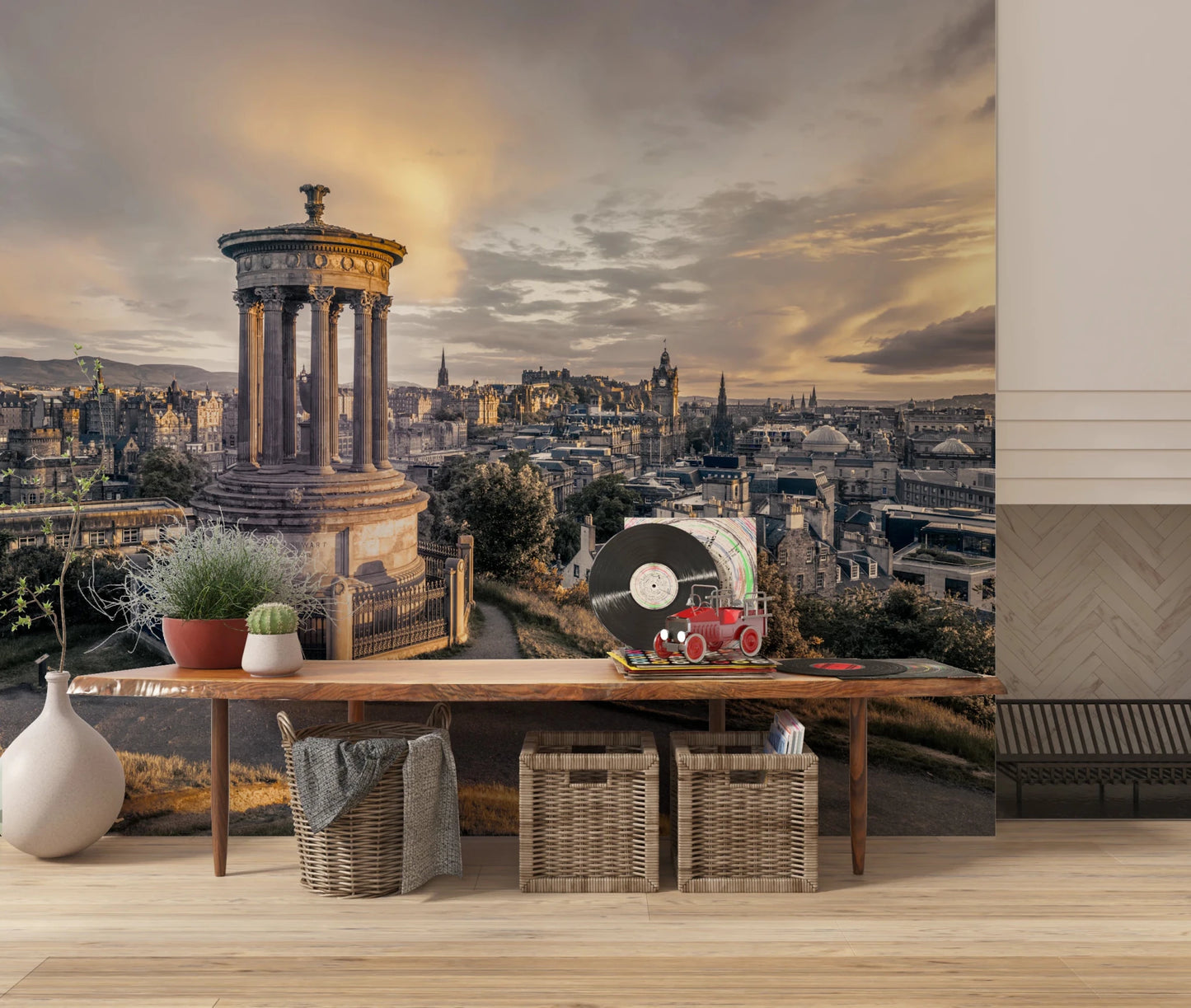 Scottish Skyline wallpaper mural of Edinburgh behind a wood entryway bench with vinyl records and baskets