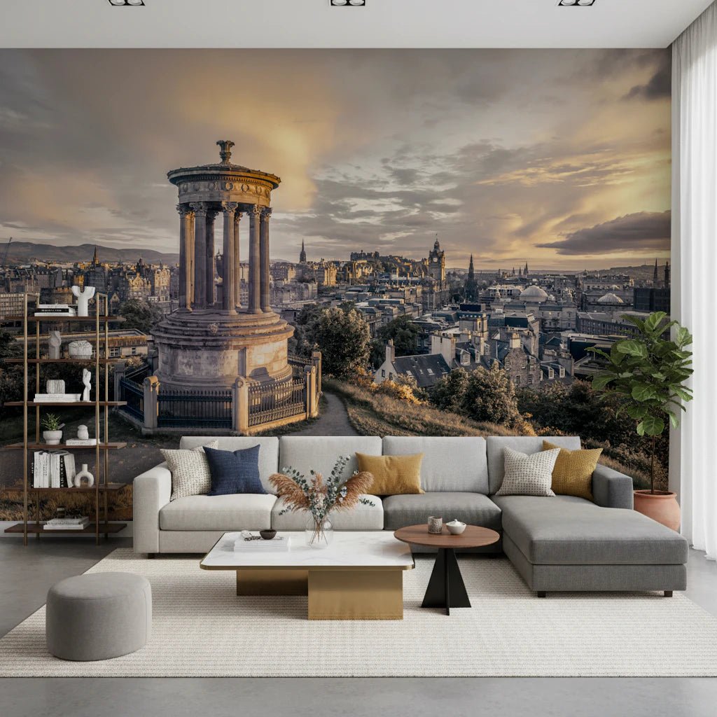 Scottish Skyline wallpaper mural of the Edinburgh skyline above a grey sectional with mustard pillows