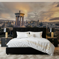 Scottish Skyline wallpaper mural of Edinburgh rooftops over a black bed with white and gold bedding