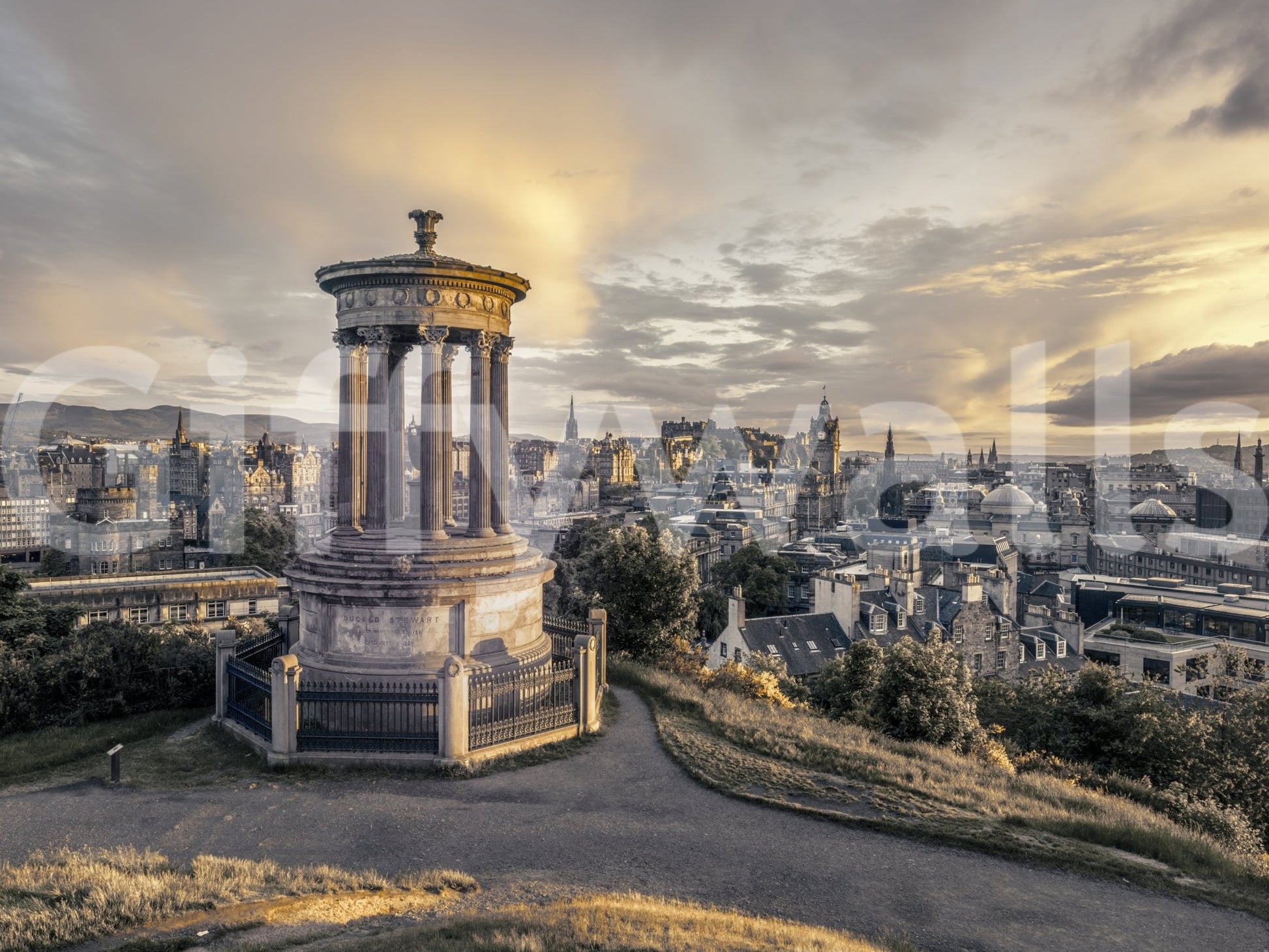 Scottish Skyline wallpaper mural full-wall view of the columned Dugald Stewart Monument over Edinburgh at sunset