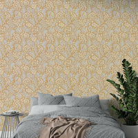Botanical mural in soft golden ochre tones

