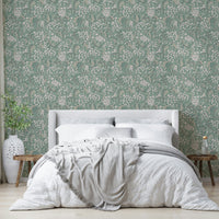 Coastal-inspired green wallpaper with foliage

