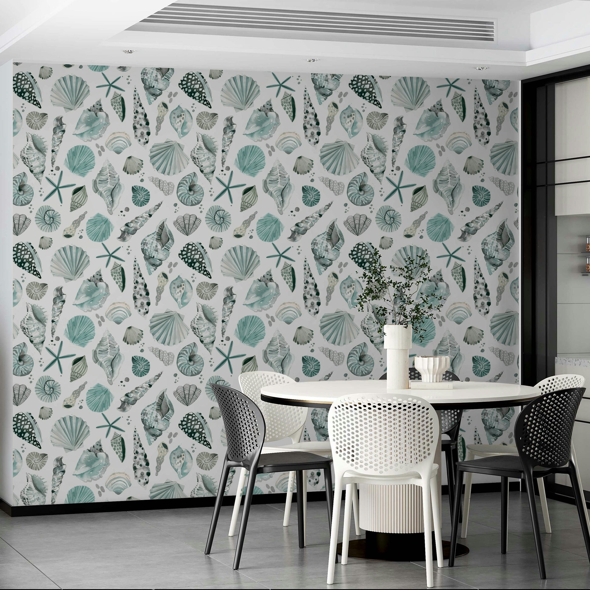 Watercolor shell wallpaper in soft blues on a white background.

