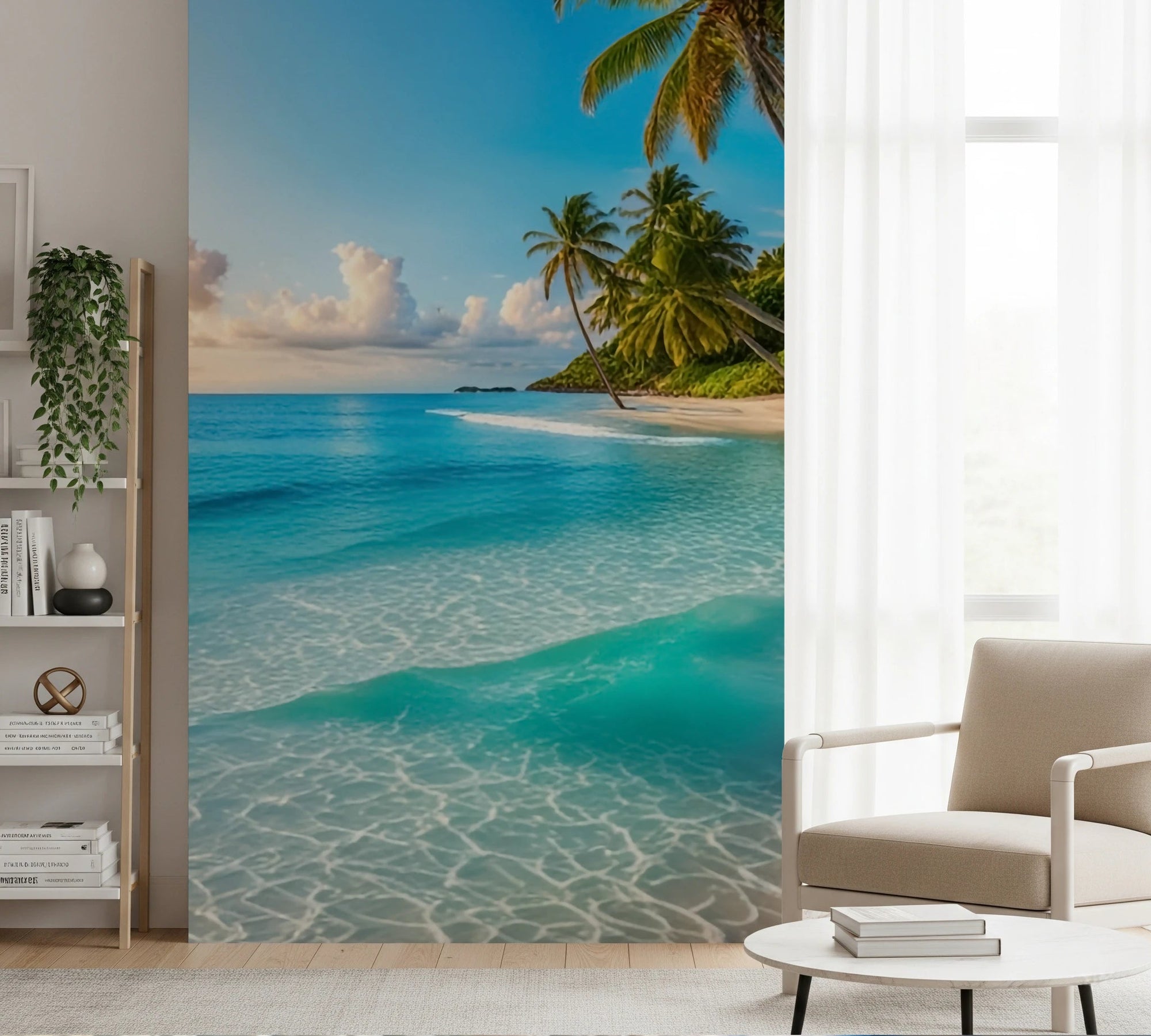 Seaside Bliss wallpaper mural with turquoise sea and palms behind a beige armchair and white bookshelf in a living room