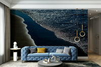 A graceful wave motion wall mural in cool, natural tones.

