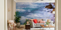 A beautiful coastal rock wallpaper mural with crashing waves.

