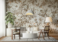 Artistic sepia mural of birds resting on floral branches, evoking timeless beauty