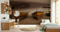 Moody nature wallpaper featuring wooden boats and a foggy lake in warm sepia shades.