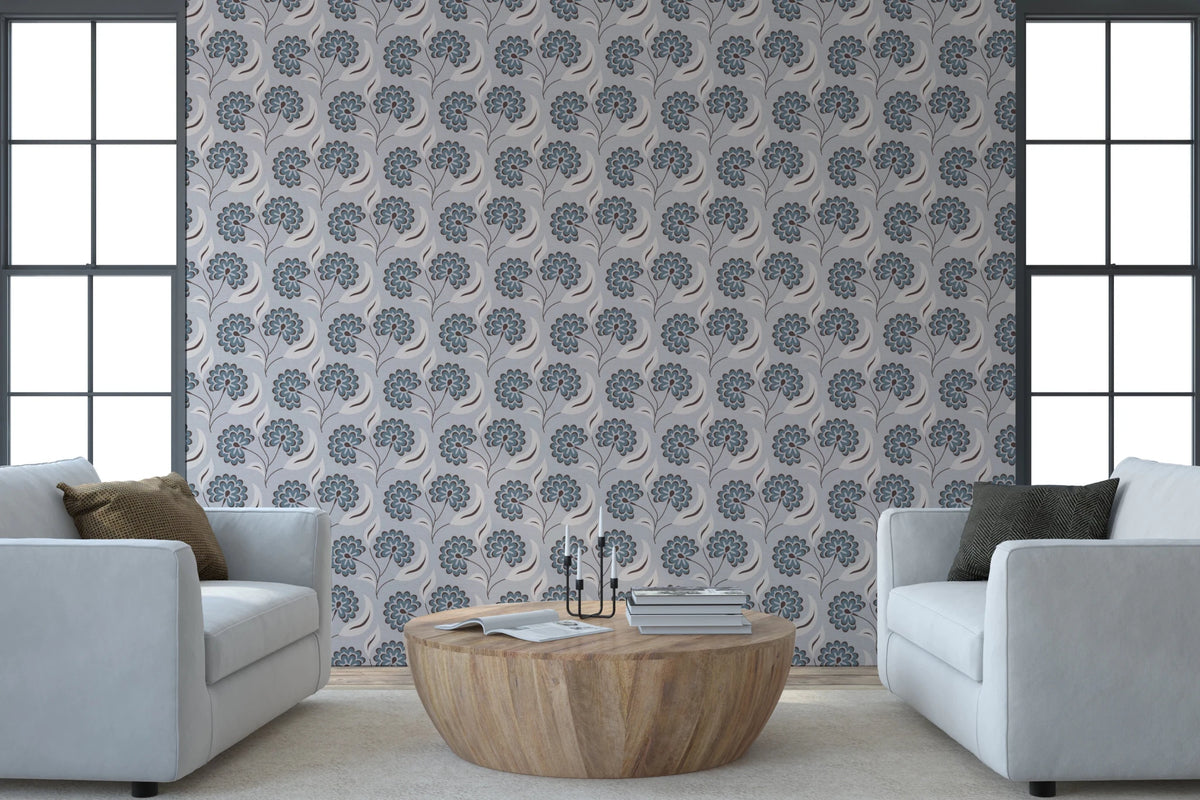 Serene Blooms wallpaper with blue-grey flowers behind two white armchairs and a round wood coffee table