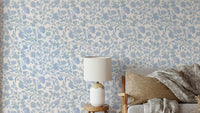 Serene blue floral wallpaper with delicate blooms

