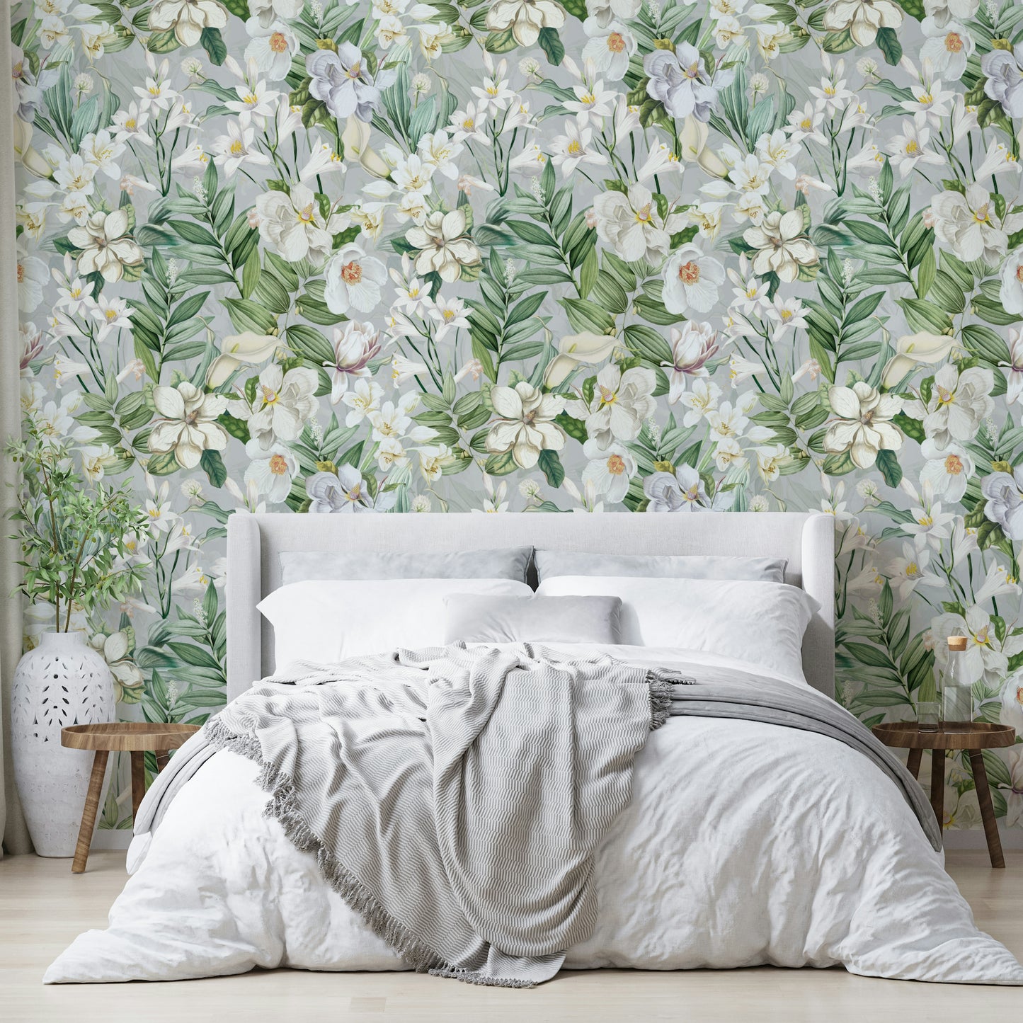 Floral wall mural with detailed botanical elements and soft hues.

