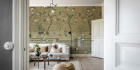 The design features a repeating pattern of soft, graceful birds and blooming branches.