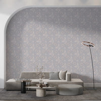 Serene Floral beige wallpaper on an arched wall behind a grey sofa and ring floor lamp in a living room