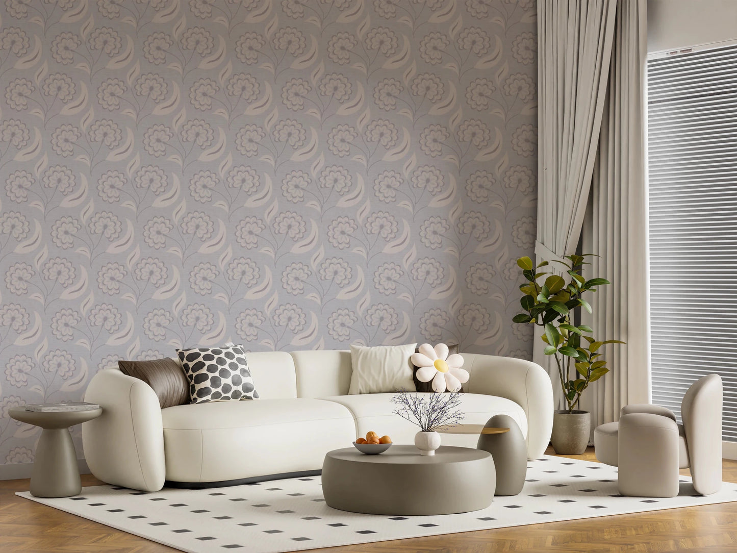 Serene Floral beige wallpaper in grey blooms behind a cream curved sofa with a daisy cushion in a living room