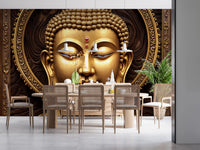 Serene Gold Buddha wallpaper mural behind a wood dining table and cane chairs under white pendant lights